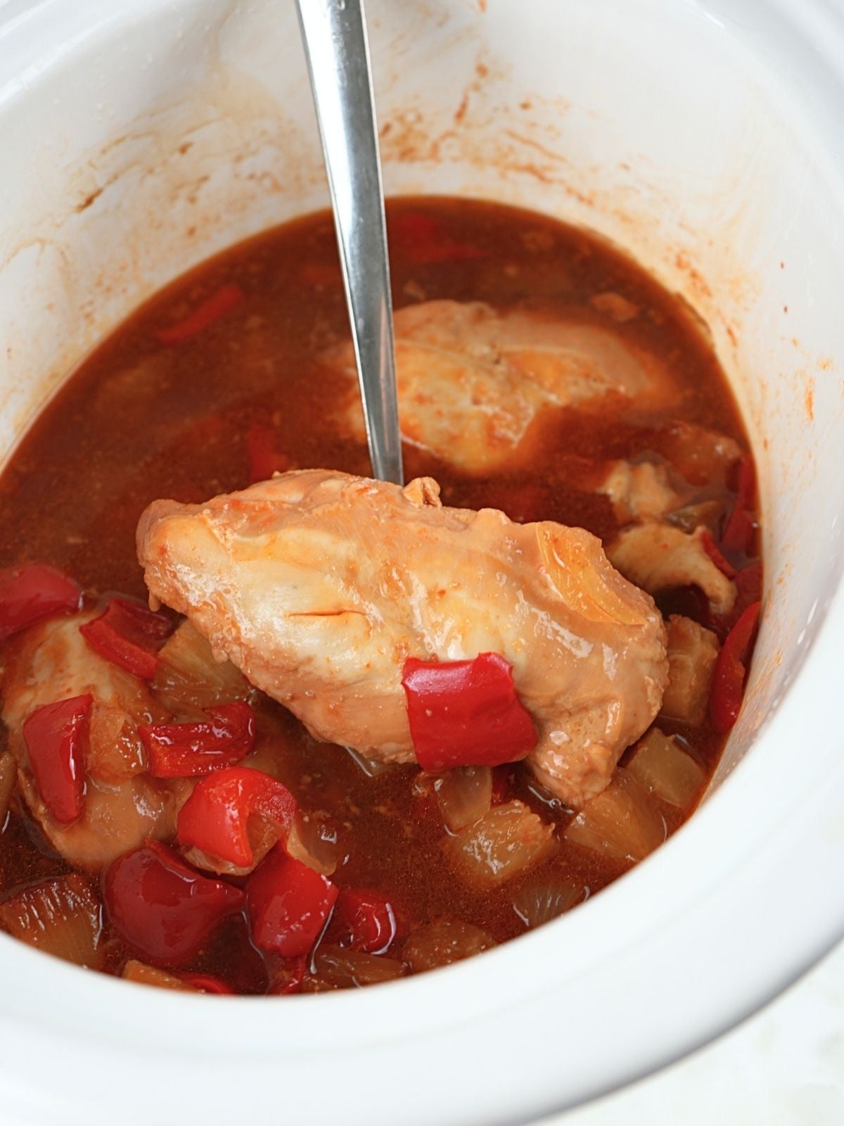 Sweet and sour chicken cooked in a slow cooker.